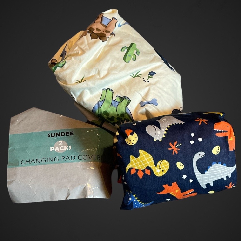 Changing pad waterproof covers, blue cream dinosaurs animals. New!
